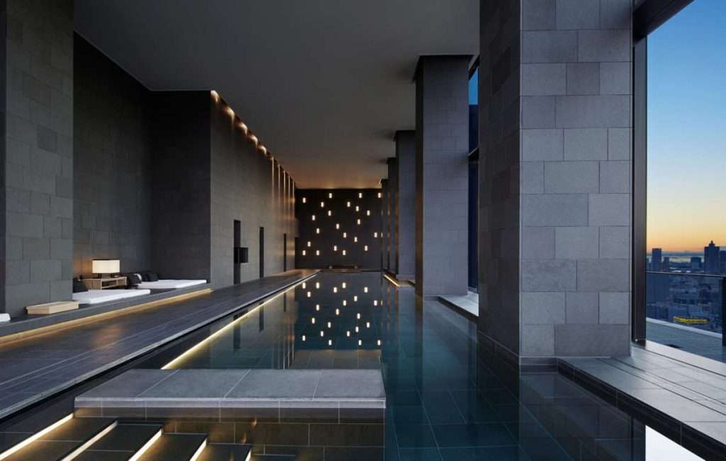 30m heated indoor pool with expansive views of the city skyline at Aman Tokyo